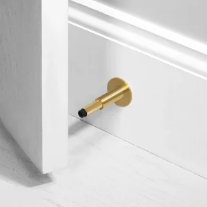 BUSTER + PUNCH® - DOOR STOP / WALL - BRASS